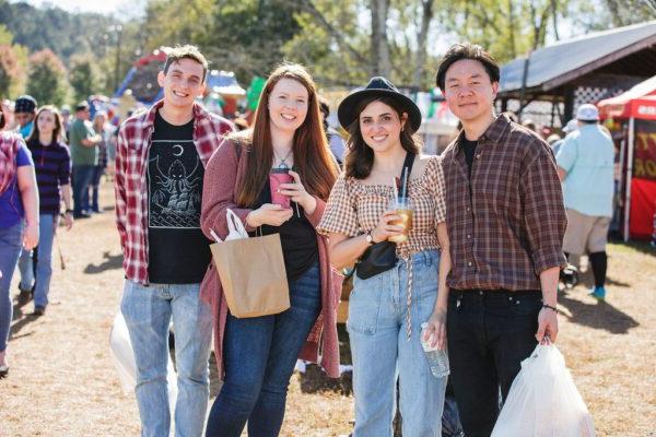 a couple enjoying food at the Apple Festival