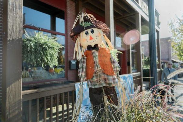 a scarecrow display outside