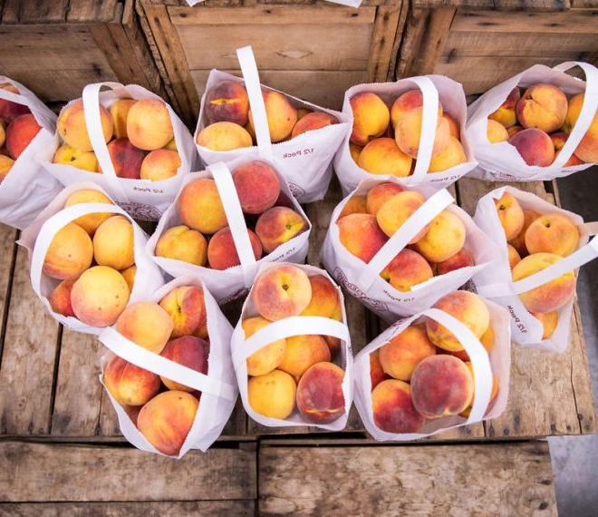 various bags of fresh peaches